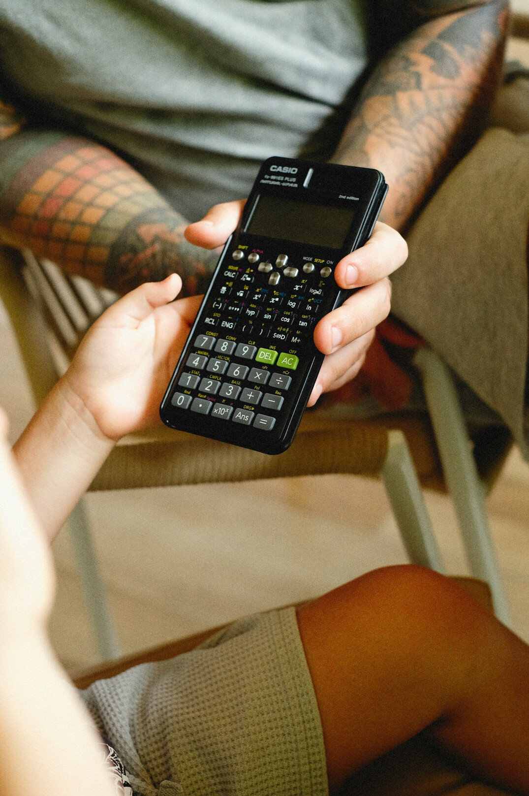 person using financial calculator