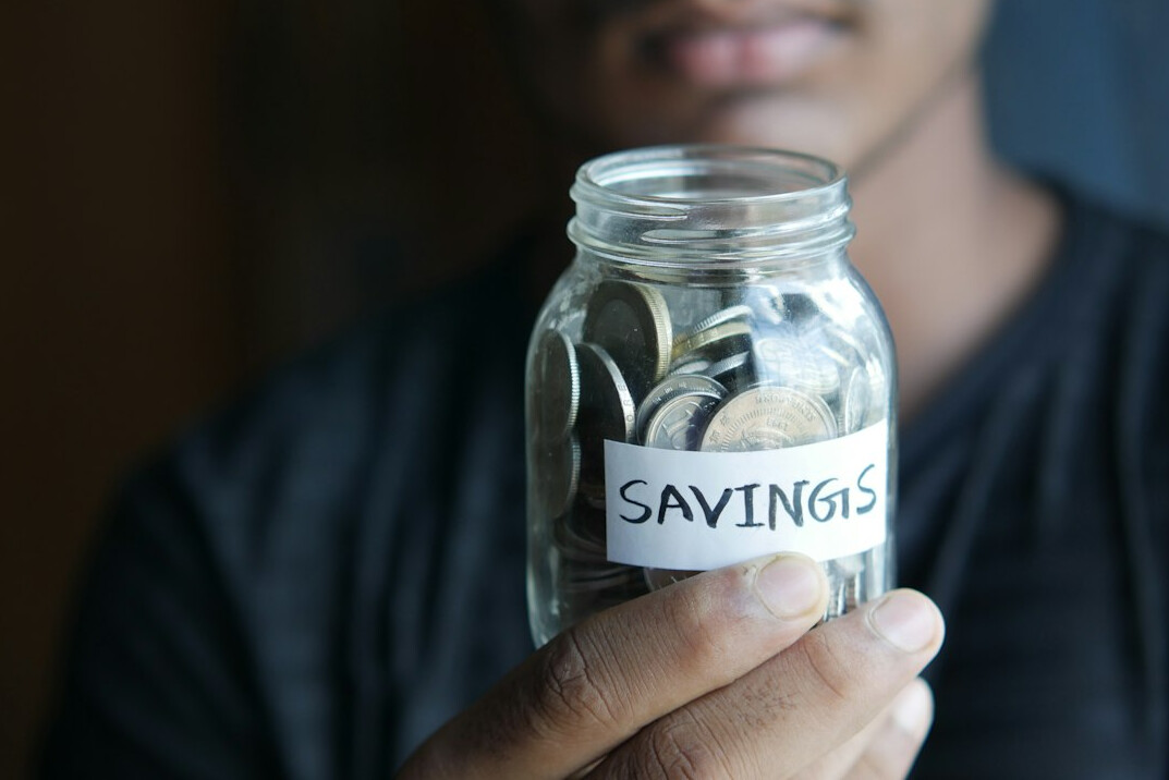 savings jar and calculator